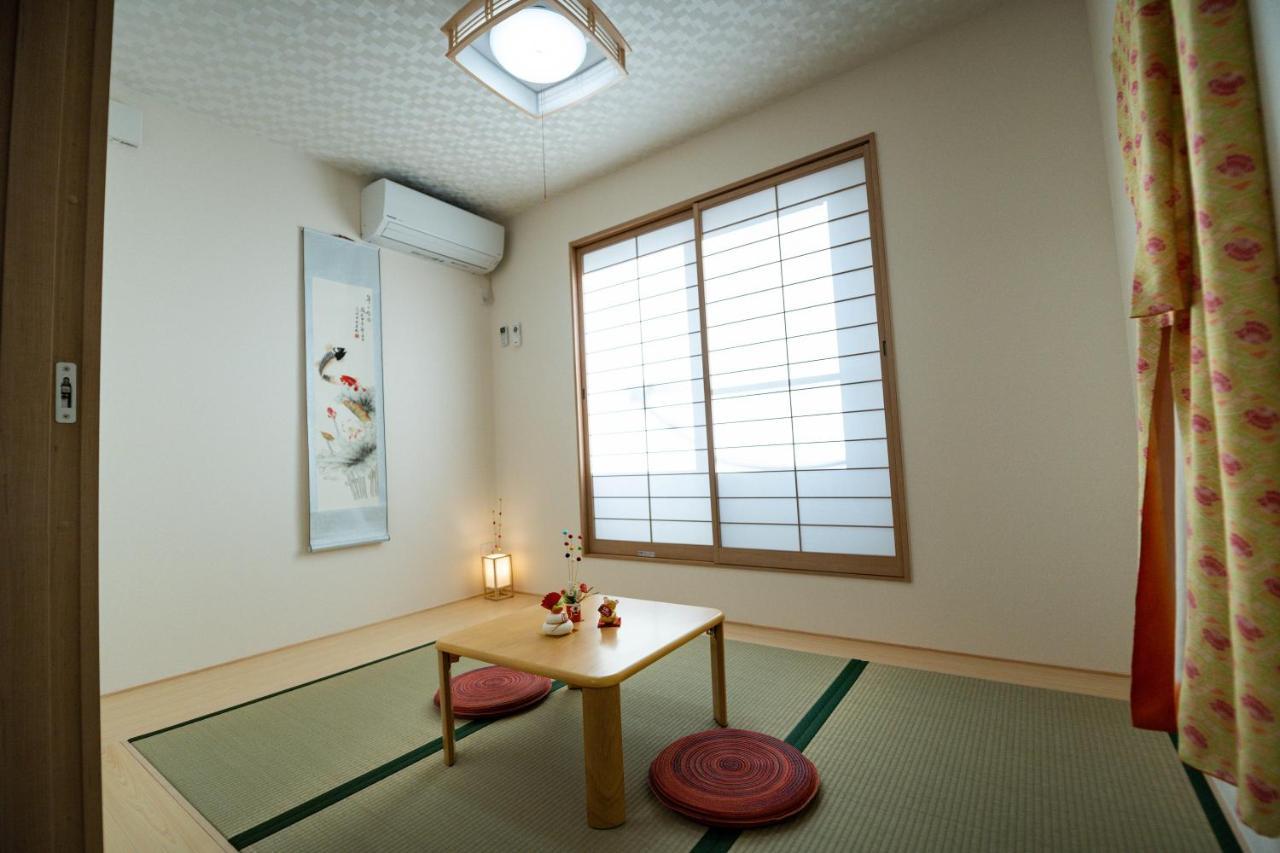 大阪ドーム徒歩10分、九条駅から3分、難波直通6分、海遊館7分、Usj11分 Villa Luaran gambar
