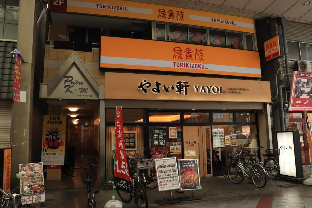 大阪ドーム徒歩10分、九条駅から3分、難波直通6分、海遊館7分、Usj11分 Villa Luaran gambar